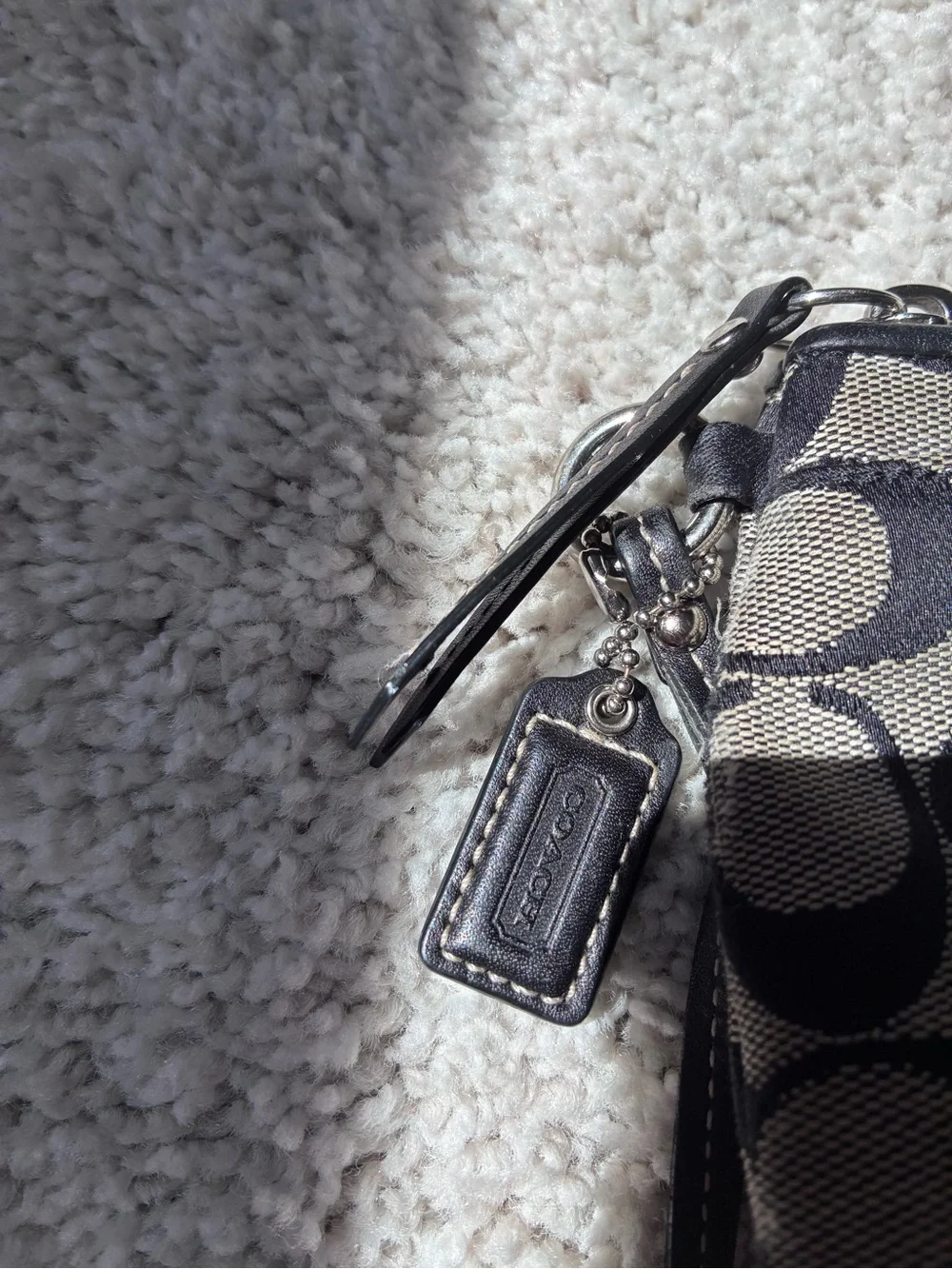 Coach Signature Canvas Wristlet in Black and tan